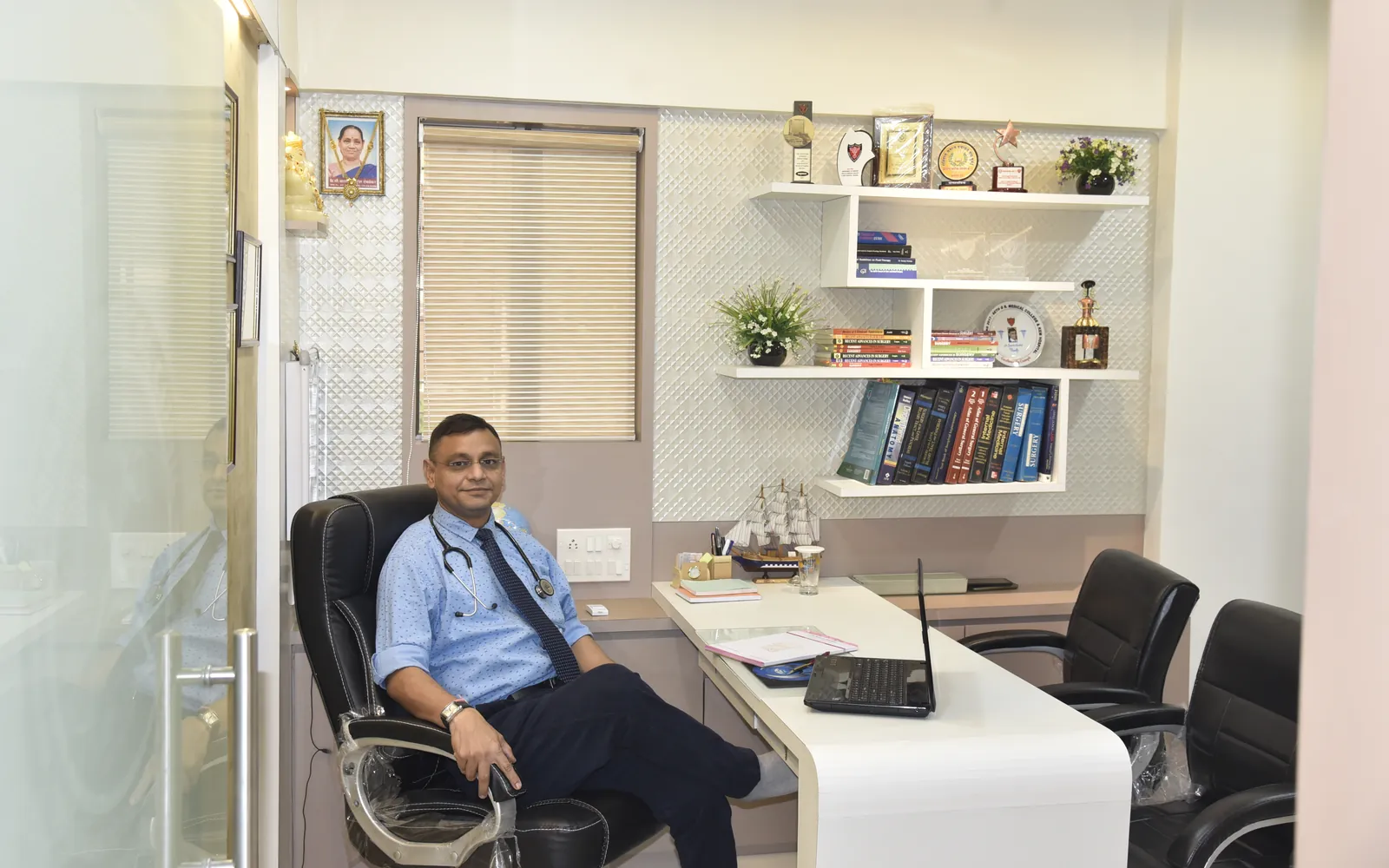Dr Samir Deolekar in his consulting room